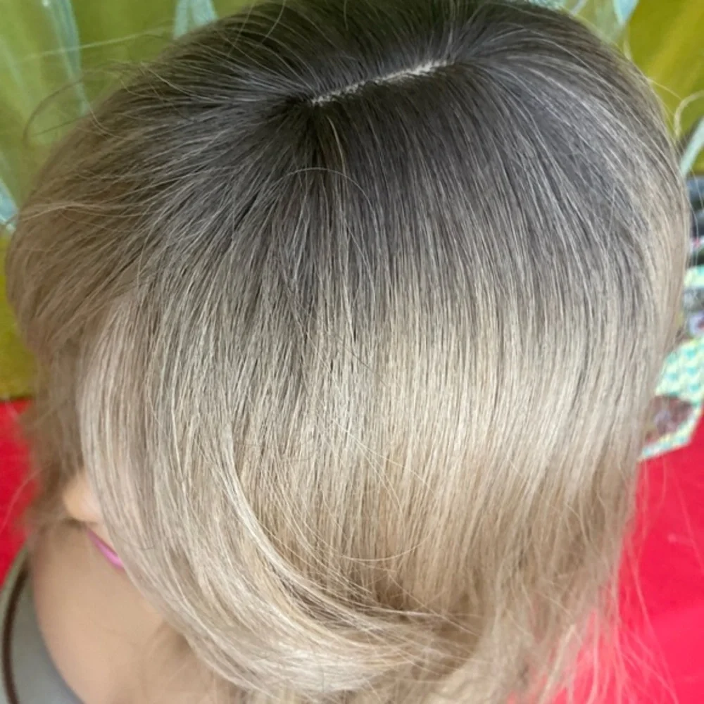 Golden dirty blonde layered wig with bangs and roots